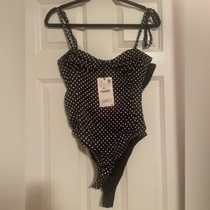 Super cute black and white polka dot bodysuit from zara.